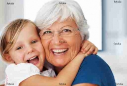 Girl embracing grandmother
