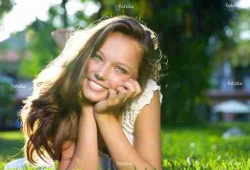 Spring Girl in Green Grass